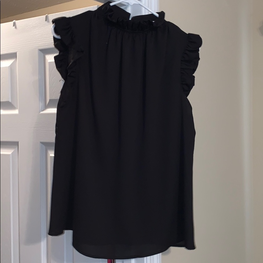 Ruffled neck black sleeveless blouse